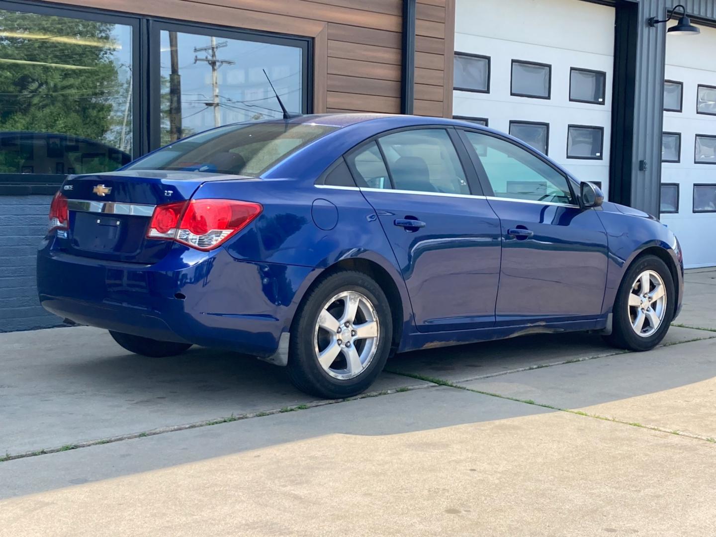 2012 Deep Water Blue Chevrolet Cruze 1LT (1G1PF5SC0C7) with an 1.4L L4 DOHC 16V TURBO engine, 6-Speed Automatic transmission, located at 1800 South Ihm Blvd, Freeport, IL, 61032, (815) 232-5543, 42.278645, -89.607994 - Cruze LT 4D Sedan - Photo#1