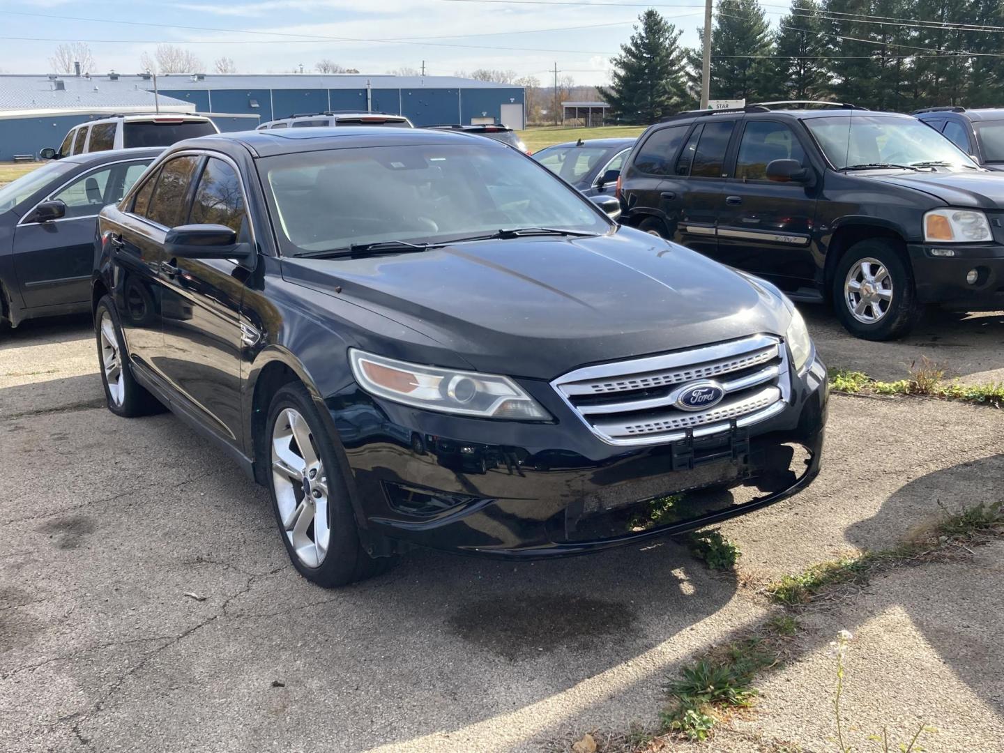 2011 Black Met Ford Taurus SHO FWD (1FAHP2KT5BG) with an 3.5L V6 DOHC 24V engine, 6-Speed Automatic transmission, located at 1800 South Ihm Blvd, Freeport, IL, 61032, (815) 232-5543, 42.278645, -89.607994 - Photo#0