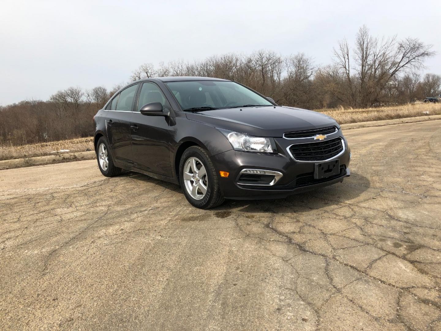 2015 Dark Graphite M Chevrolet Cruze 1LT Auto (1G1PC5SBXF7) with an 1.4L L4 DOHC 16V TURBO engine, 6-Speed Automatic transmission, located at 1800 South Ihm Blvd, Freeport, IL, 61032, (815) 232-5543, 42.278645, -89.607994 - Photo#3