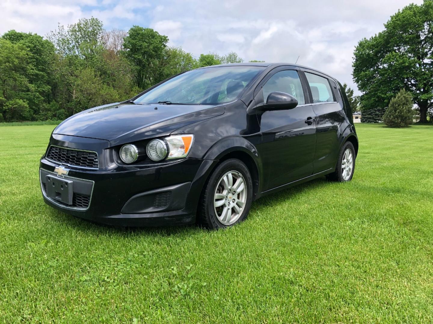 2012 Black Chevrolet Sonic 2LT 5-Door (1G1JC6SH2C4) with an 1.8L L4 DOHC 24V FFV engine, 6-Speed Automatic transmission, located at 1800 South Ihm Blvd, Freeport, IL, 61032, (815) 232-5543, 42.278645, -89.607994 - Photo#0