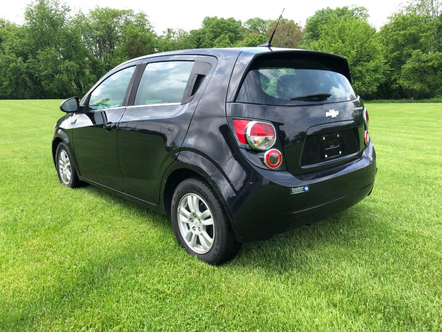 2012 Black Chevrolet Sonic 2LT 5-Door (1G1JC6SH2C4) with an 1.8L L4 DOHC 24V FFV engine, 6-Speed Automatic transmission, located at 1800 South Ihm Blvd, Freeport, IL, 61032, (815) 232-5543, 42.278645, -89.607994 - Photo#1