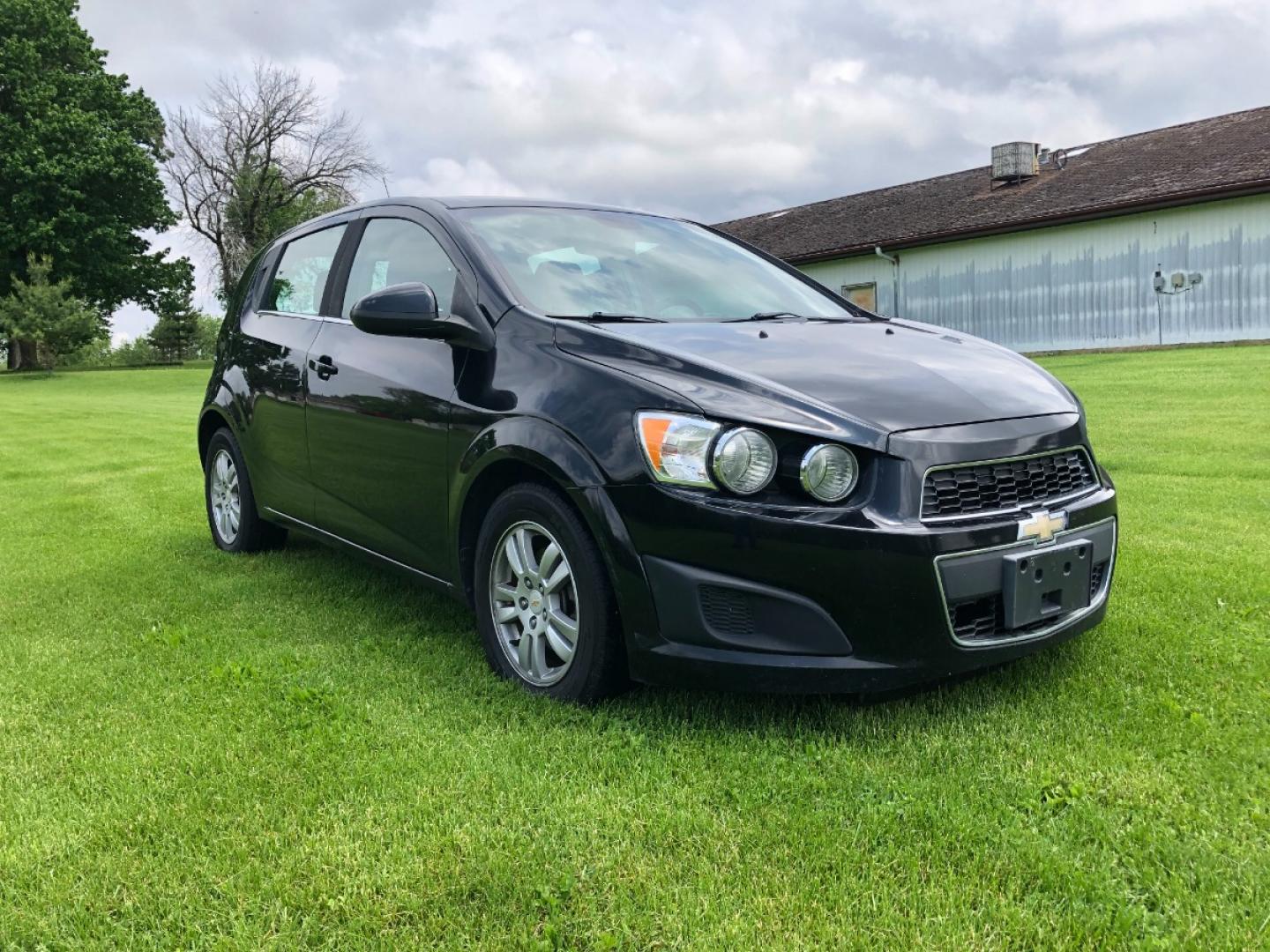 2012 Black Chevrolet Sonic 2LT 5-Door (1G1JC6SH2C4) with an 1.8L L4 DOHC 24V FFV engine, 6-Speed Automatic transmission, located at 1800 South Ihm Blvd, Freeport, IL, 61032, (815) 232-5543, 42.278645, -89.607994 - Photo#3