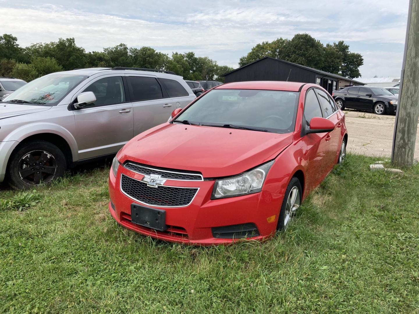 2014 Red Chevrolet Cruze 2LT Auto (1G1PE5SB0E7) with an 1.4L L4 DOHC 16V TURBO engine, 6-Speed Automatic transmission, located at 1800 South Ihm Blvd, Freeport, IL, 61032, (815) 232-5543, 42.278645, -89.607994 - Cruze LT 4D Sedan - Photo#0