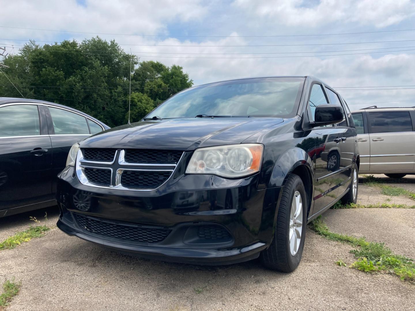 2014 Black Dodge Grand Caravan SXT (2C4RDGCG6ER) with an 3.6L V6 DOHC 24V engine, 6-Speed Automatic transmission, located at 1800 South Ihm Blvd, Freeport, IL, 61032, (815) 232-5543, 42.278645, -89.607994 - Photo#0