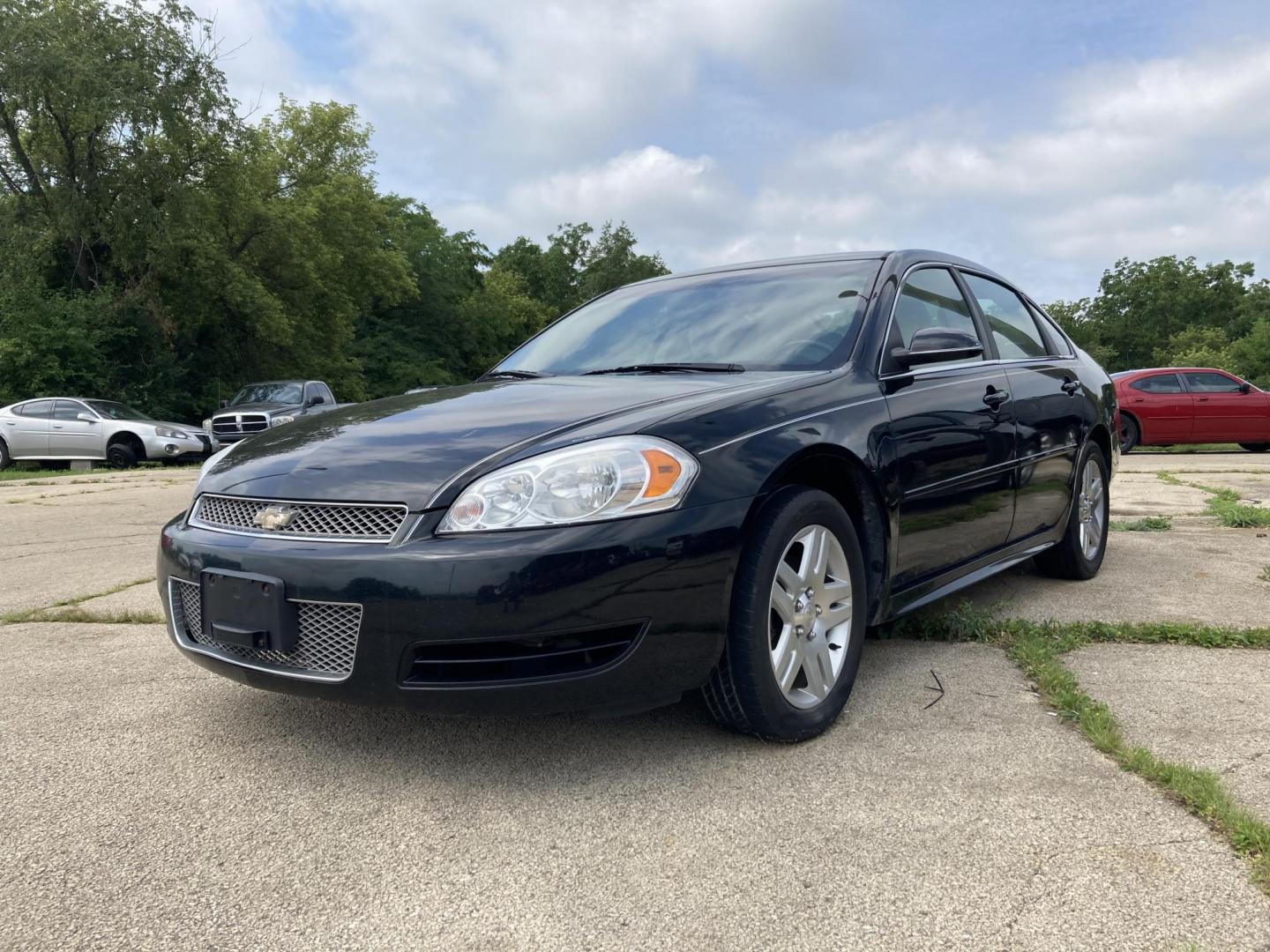 2012 Black Granite Met Chevrolet Impala LT (Fleet) (2G1WG5E3XC1) with an 3.6L V6 DOHC 16V FFV engine, 6-Speed Automatic transmission, located at 1800 South Ihm Blvd, Freeport, IL, 61032, (815) 232-5543, 42.278645, -89.607994 - Impala LT 4D Sedan - Photo#0