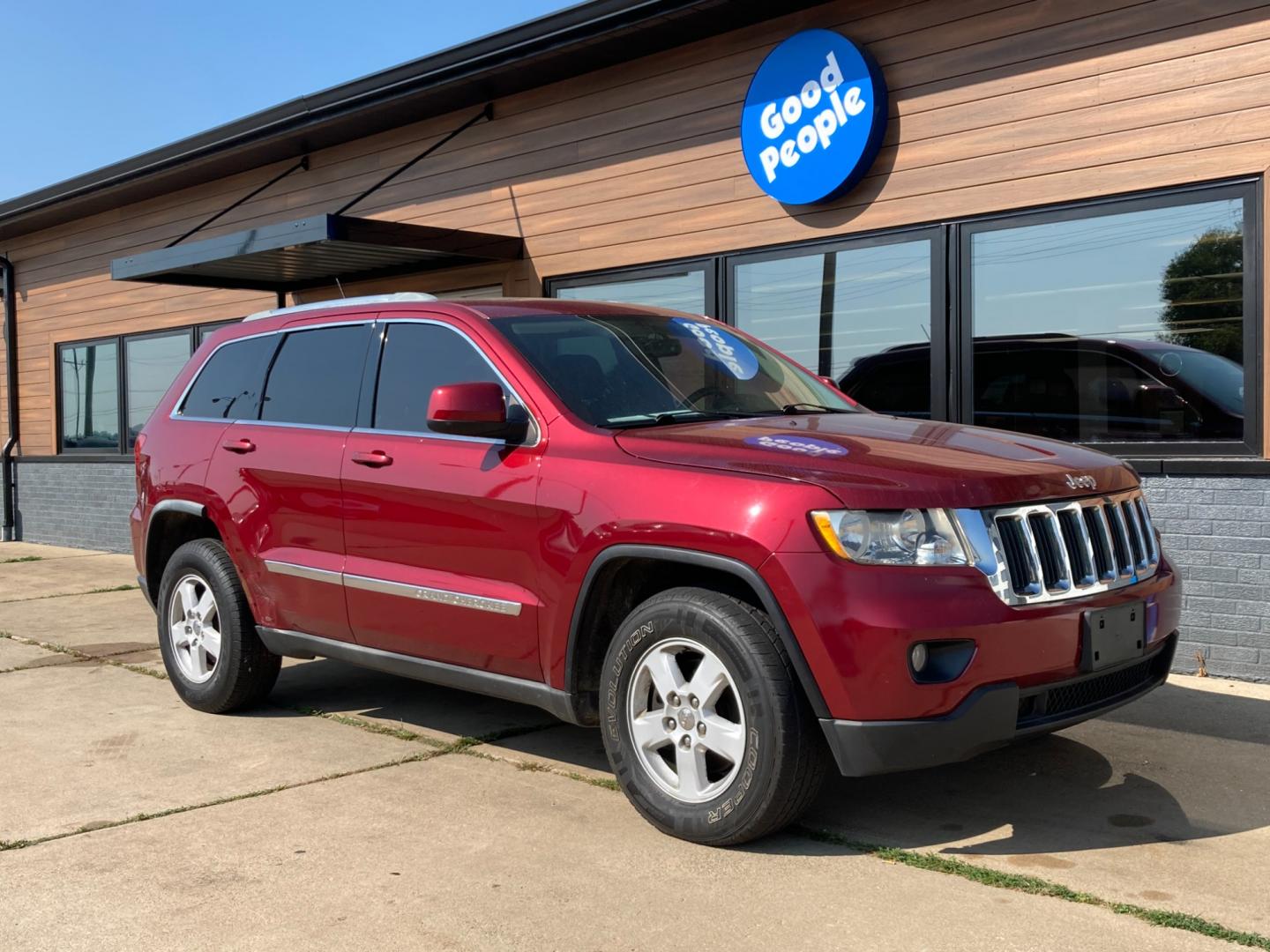 2012 Ruby Red Met Jeep Grand Cherokee Laredo 4WD (1C4RJFAG4CC) with an 3.6L V6 DOHC 24V engine, 5-Speed Automatic transmission, located at 1800 South Ihm Blvd, Freeport, IL, 61032, (815) 232-5543, 42.278645, -89.607994 - Grand Cherokee Laredo 4D SUV 4WD - Photo#0