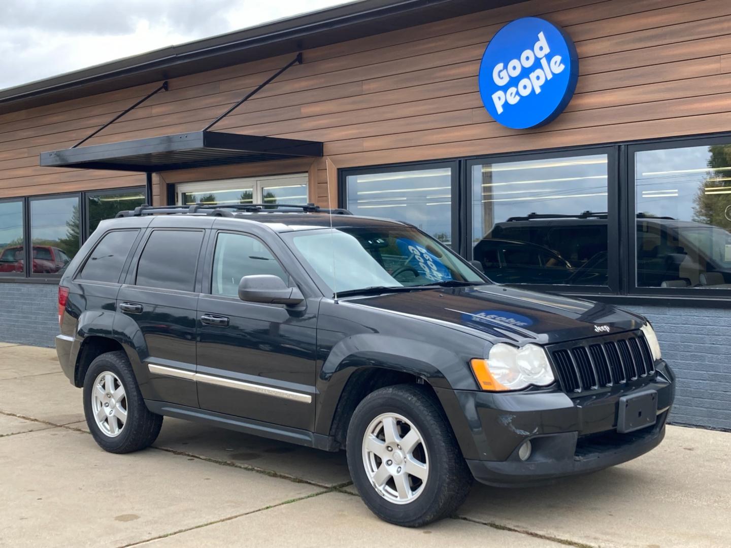 2010 Black Met Jeep Grand Cherokee Laredo 4WD (1J4PR4GK6AC) with an 3.7L V6 SOHC 12V engine, 5-Speed Automatic transmission, located at 1800 South Ihm Blvd, Freeport, IL, 61032, (815) 232-5543, 42.278645, -89.607994 - Photo#0