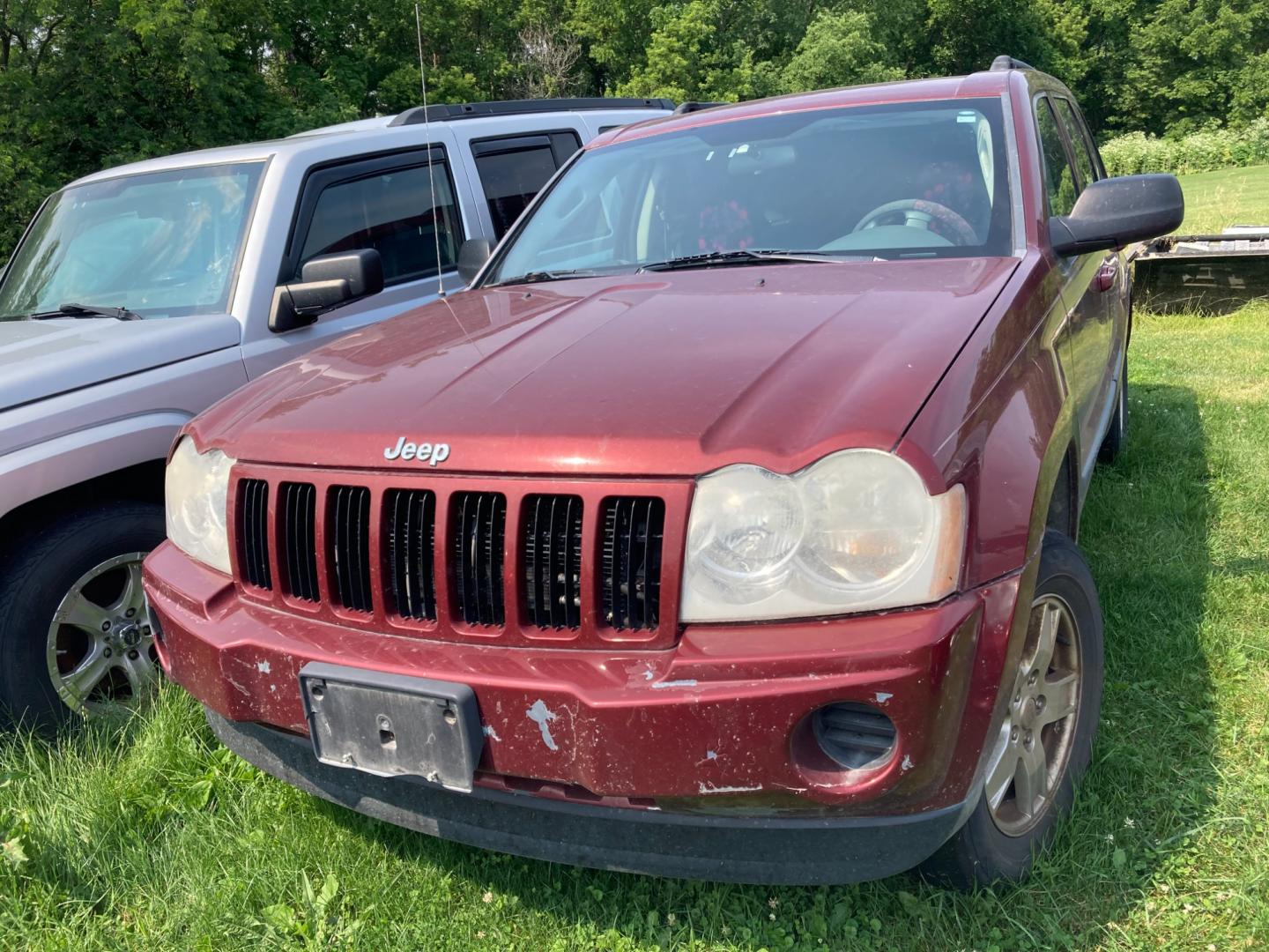 2007 Rock Red Met Jeep Grand Cherokee Laredo (1J8GR48K07C) with an 3.7L V6 MPI engine, located at 1800 South Ihm Blvd, Freeport, IL, 61032, (815) 232-5543, 42.278645, -89.607994 - Photo#0