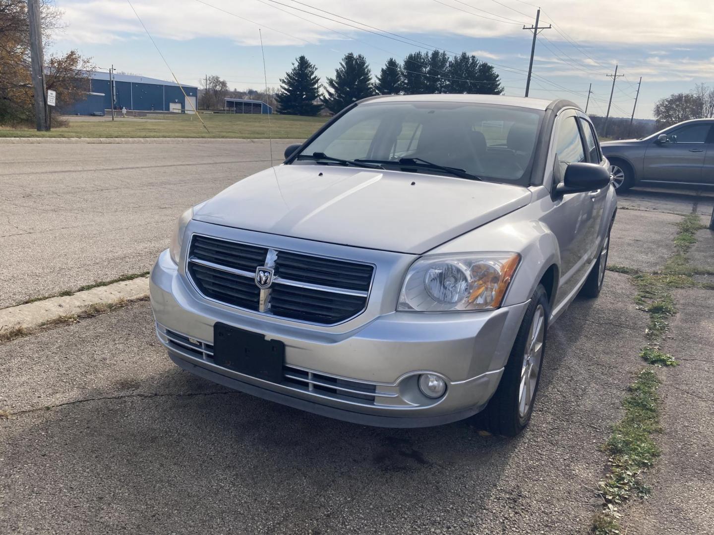 2011 Billit Silver Dodge Caliber Heat (1B3CB5HA9BD) with an 2.0L L4 DOHC 16V engine, 5-Speed Manual transmission, located at 1800 South Ihm Blvd, Freeport, IL, 61032, (815) 232-5543, 42.278645, -89.607994 - Photo#0