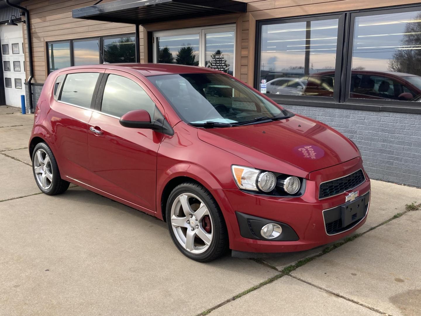 2012 Firethorn Red Met Chevrolet Sonic LTZ 5-Door (1G1JE6SH3C4) with an 1.8L L4 DOHC 24V FFV engine, 6-Speed Automatic transmission, located at 1800 South Ihm Blvd, Freeport, IL, 61032, (815) 232-5543, 42.278645, -89.607994 - Photo#2