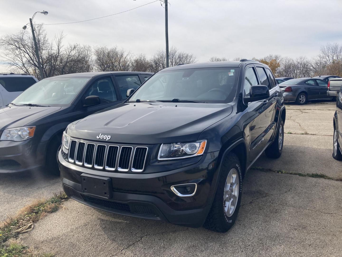 2014 Jet Black Jeep Grand Cherokee Laredo 4WD (1C4RJFAG1EC) with an 3.6L V6 DOHC 24V engine, 5-Speed Automatic transmission, located at 1800 South Ihm Blvd, Freeport, IL, 61032, (815) 232-5543, 42.278645, -89.607994 - Grand Cherokee Laredo 4D SUV 4WD - Photo#0