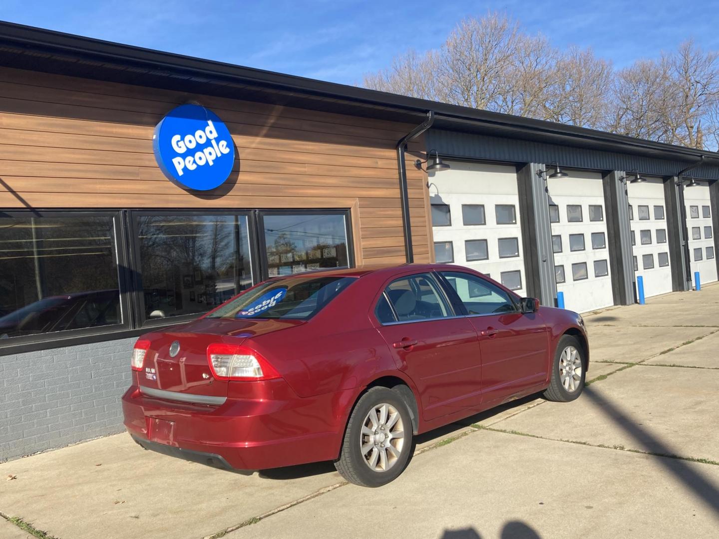 2006 Inferno Red Met Mercury Milan V6 (3MEFM07176R) with an 3.0L V6 DOHC 24V engine, 6-Speed Automatic Overdrive transmission, located at 1800 South Ihm Blvd, Freeport, IL, 61032, (815) 232-5543, 42.278645, -89.607994 - Photo#1