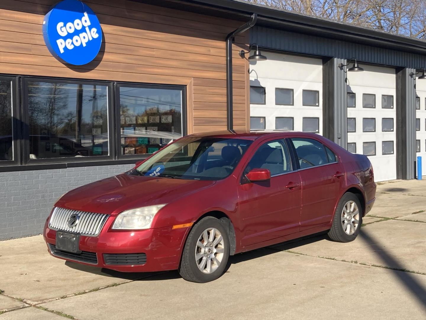 2006 Inferno Red Met Mercury Milan V6 (3MEFM07176R) with an 3.0L V6 DOHC 24V engine, 6-Speed Automatic Overdrive transmission, located at 1800 South Ihm Blvd, Freeport, IL, 61032, (815) 232-5543, 42.278645, -89.607994 - Photo#3