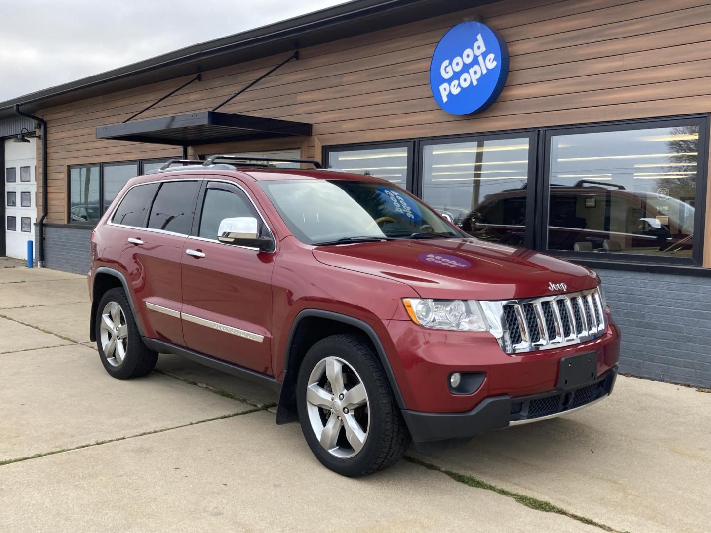 2012 Garnet Red Met. Jeep Grand Cherokee Overland 4WD (1C4RJFCT6CC) with an 5.7L V8 OHV 16V engine, 5-Speed Automatic transmission, located at 1800 South Ihm Blvd, Freeport, IL, 61032, (815) 232-5543, 42.278645, -89.607994 - Grand Cherokee Overland 4D SUV 4WD - Photo#0