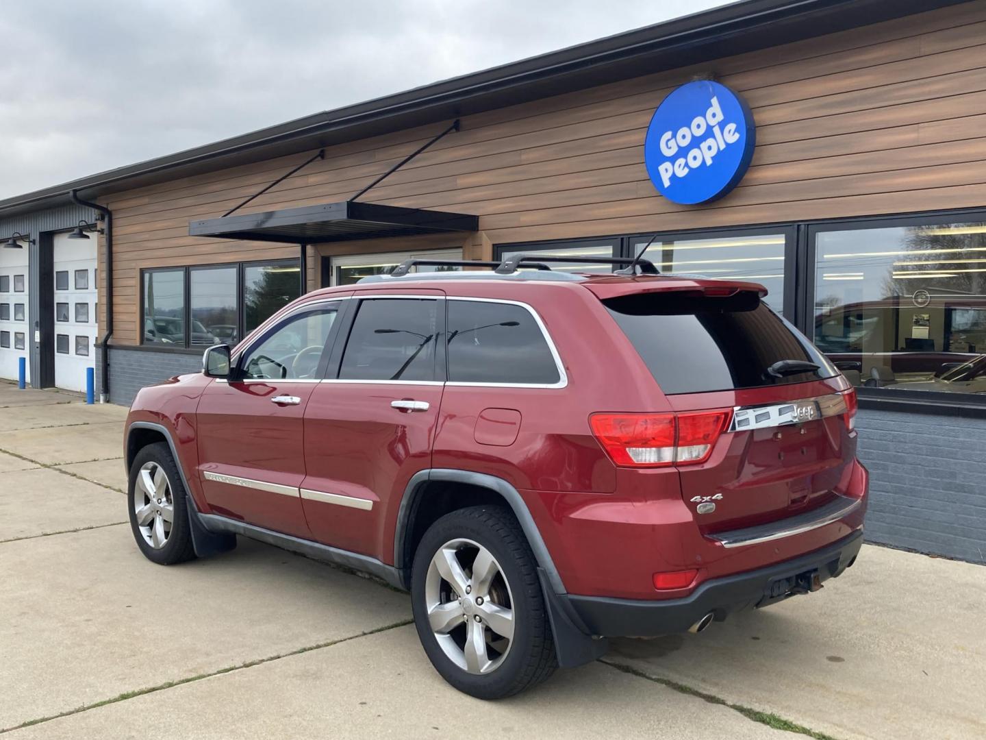 2012 Garnet Red Met. Jeep Grand Cherokee Overland 4WD (1C4RJFCT6CC) with an 5.7L V8 OHV 16V engine, 5-Speed Automatic transmission, located at 1800 South Ihm Blvd, Freeport, IL, 61032, (815) 232-5543, 42.278645, -89.607994 - Grand Cherokee Overland 4D SUV 4WD - Photo#2