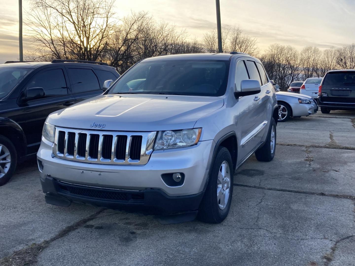 2012 Sebring silver Jeep Grand Cherokee Laredo 4WD (1C4RJFAG4CC) with an 3.6L V6 DOHC 24V engine, 5-Speed Automatic transmission, located at 1800 South Ihm Blvd, Freeport, IL, 61032, (815) 232-5543, 42.278645, -89.607994 - Grand Cherokee Laredo 4D SUV 4WD - Photo#0