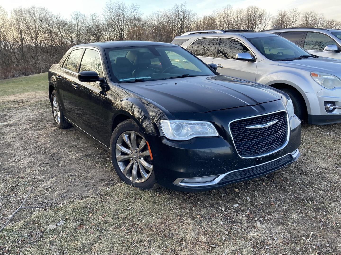 2016 Jet Black Chrysler 300 Limited AWD (2C3CCARG5GH) with an 3.6L V6 SOHC 24V engine, 8A transmission, located at 1800 South Ihm Blvd, Freeport, IL, 61032, (815) 232-5543, 42.278645, -89.607994 - 300 Limited 4D Sedan AWD - Photo#0