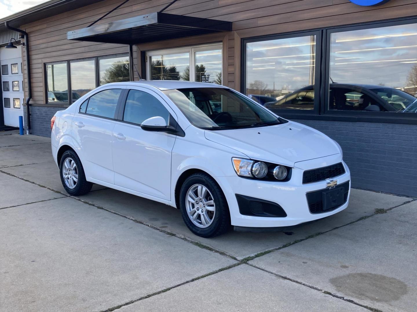 2012 Arctic White Chevrolet Sonic 2LS Sedan (1G1JA5SHXC4) with an 1.8L L4 DOHC 24V FFV engine, 6-Speed Automatic transmission, located at 1800 South Ihm Blvd, Freeport, IL, 61032, (815) 232-5543, 42.278645, -89.607994 - Sonic 2LS 4D Sedan - Photo#0