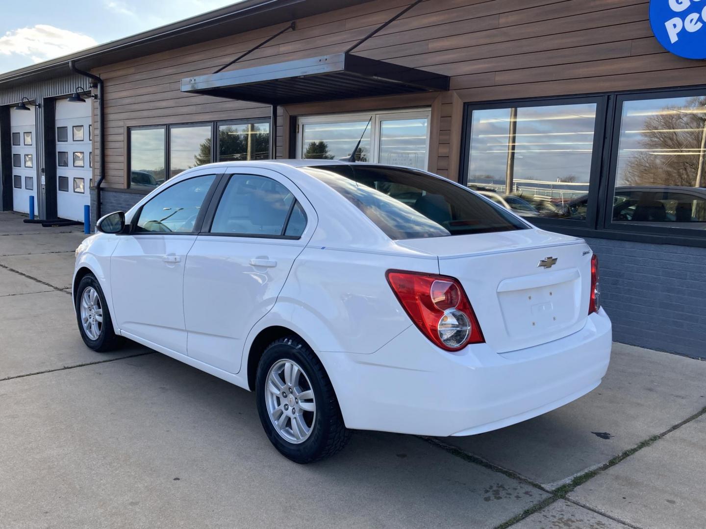 2012 Arctic White Chevrolet Sonic 2LS Sedan (1G1JA5SHXC4) with an 1.8L L4 DOHC 24V FFV engine, 6-Speed Automatic transmission, located at 1800 South Ihm Blvd, Freeport, IL, 61032, (815) 232-5543, 42.278645, -89.607994 - Sonic 2LS 4D Sedan - Photo#2