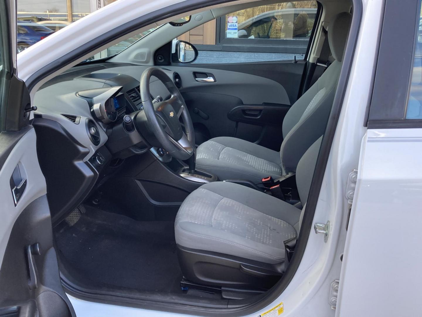 2012 Arctic White Chevrolet Sonic 2LS Sedan (1G1JA5SHXC4) with an 1.8L L4 DOHC 24V FFV engine, 6-Speed Automatic transmission, located at 1800 South Ihm Blvd, Freeport, IL, 61032, (815) 232-5543, 42.278645, -89.607994 - Sonic 2LS 4D Sedan - Photo#4