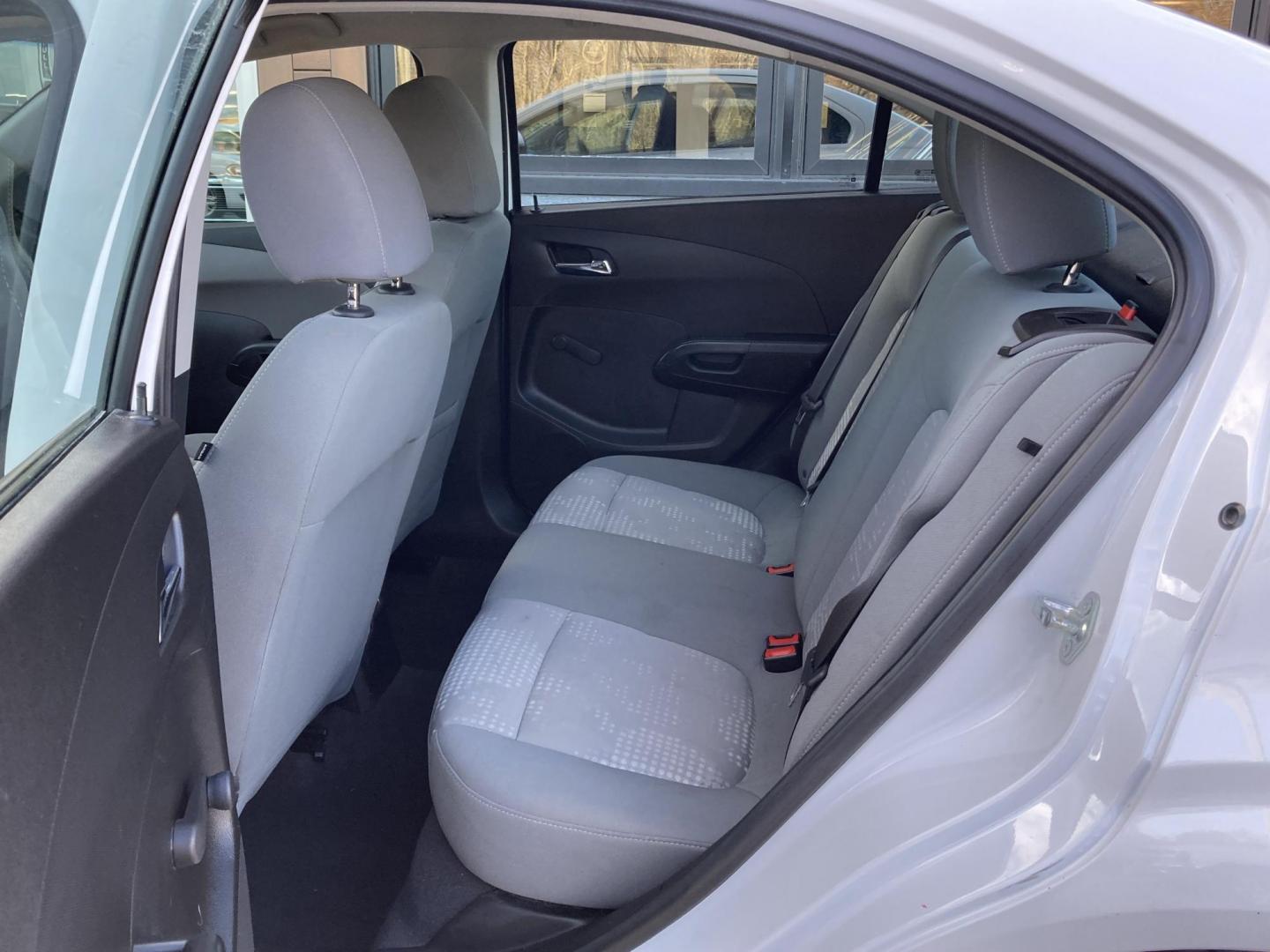 2012 Arctic White Chevrolet Sonic 2LS Sedan (1G1JA5SHXC4) with an 1.8L L4 DOHC 24V FFV engine, 6-Speed Automatic transmission, located at 1800 South Ihm Blvd, Freeport, IL, 61032, (815) 232-5543, 42.278645, -89.607994 - Sonic 2LS 4D Sedan - Photo#7