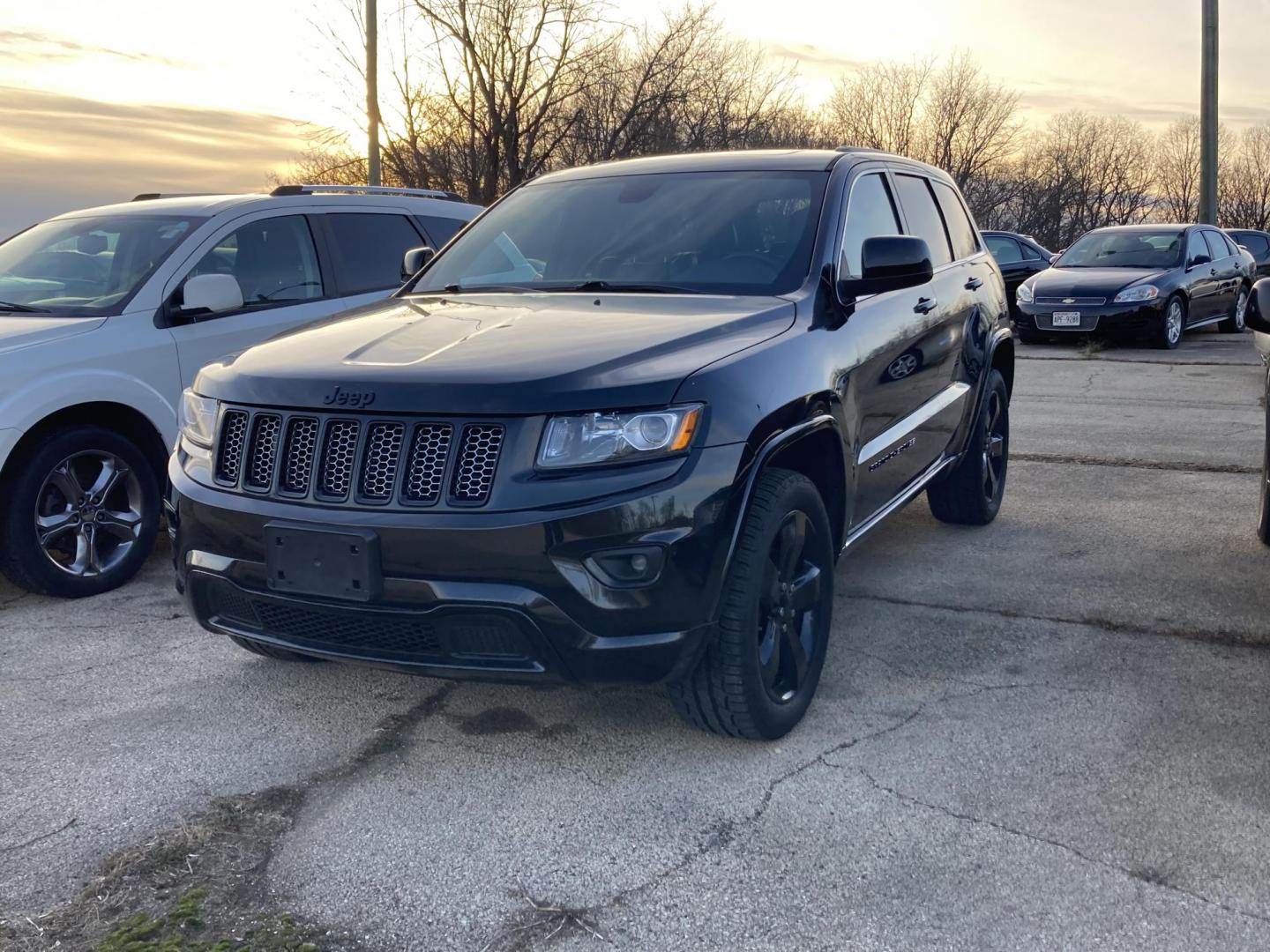 2015 Black Jeep Grand Cherokee Laredo 4WD (1C4RJFAG6FC) with an 3.6L V6 DOHC 24V engine, 8-Speed Automatic transmission, located at 1800 South Ihm Blvd, Freeport, IL, 61032, (815) 232-5543, 42.278645, -89.607994 - Grand Cherokee Laredo 4D SUV 4WD - Photo#0