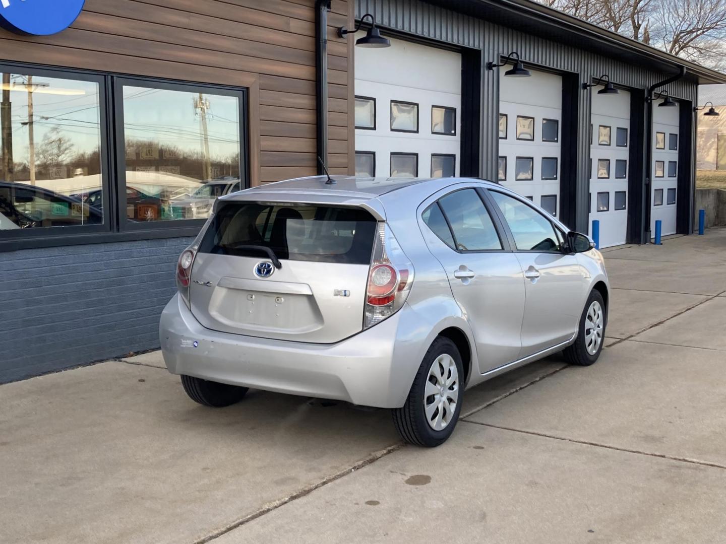 2014 Classic Silver Met Toyota Prius c Four (JTDKDTB34E1) with an 1.5L L4 DOHC 16V HYBRID engine, Continuously Variable Transmission transmission, located at 1800 South Ihm Blvd, Freeport, IL, 61032, (815) 232-5543, 42.278645, -89.607994 - Photo#0