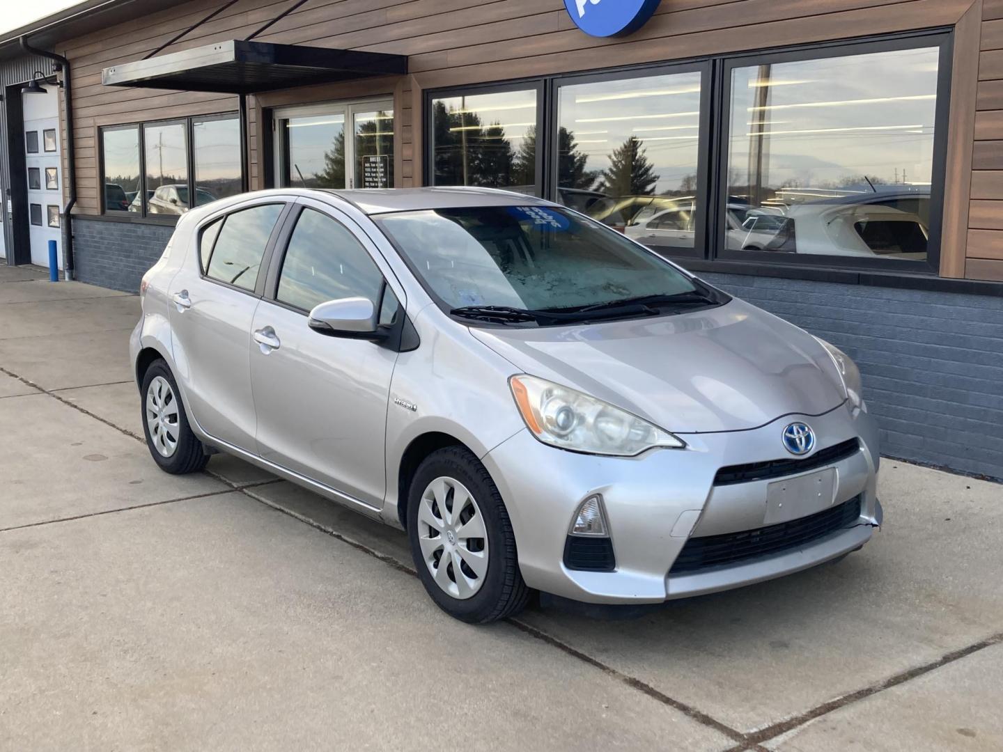 2014 Classic Silver Met Toyota Prius c Four (JTDKDTB34E1) with an 1.5L L4 DOHC 16V HYBRID engine, Continuously Variable Transmission transmission, located at 1800 South Ihm Blvd, Freeport, IL, 61032, (815) 232-5543, 42.278645, -89.607994 - Photo#1