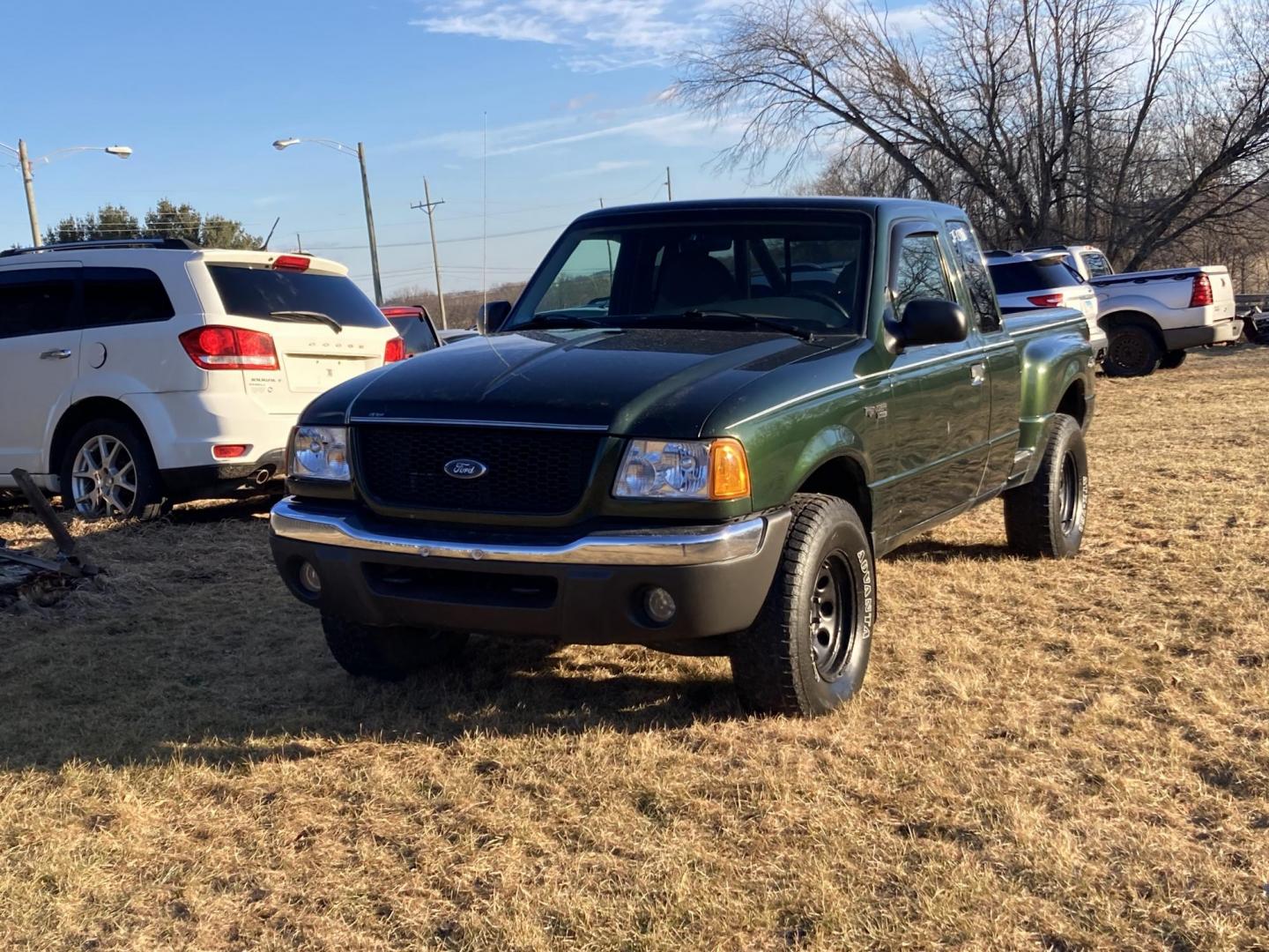 2001 Forest Green Met Ford Ranger Edge Plus SuperCab 4.0 4WD (1FTZR15E81T) with an 4.0L V6 SOHC 12V engine, 5-Speed Automatic Overdrive transmission, located at 1800 South Ihm Blvd, Freeport, IL, 61032, (815) 232-5543, 42.278645, -89.607994 - Photo#0