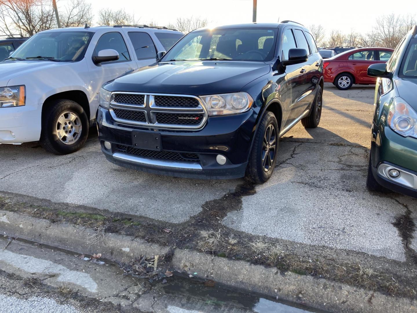 2013 Black Crystal Dodge Durango SXT AWD (1C4RDJAGXDC) with an 3.6L V6 DOHC 24V engine, 5-Speed Automatic transmission, located at 1800 South Ihm Blvd, Freeport, IL, 61032, (815) 232-5543, 42.278645, -89.607994 - Photo#0